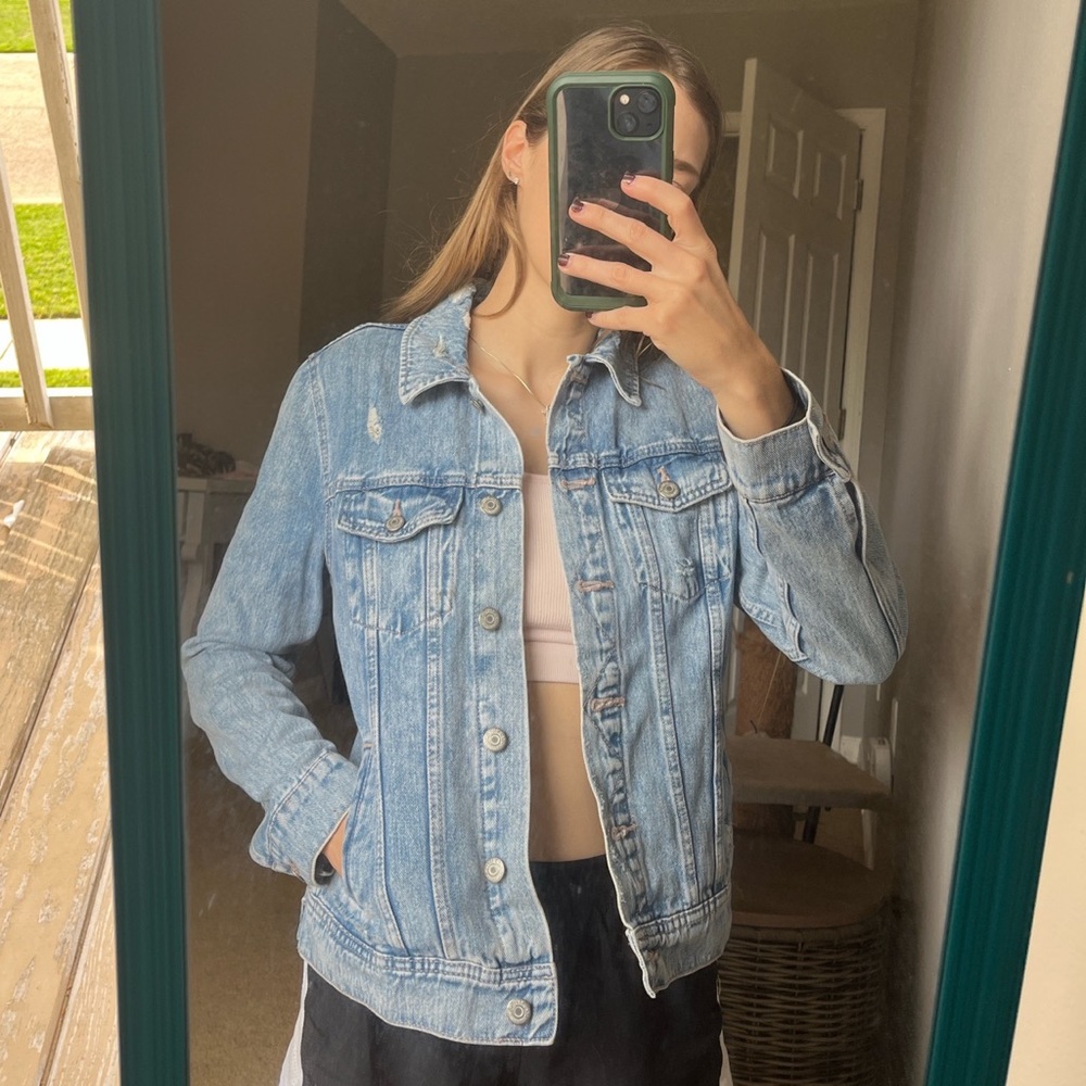 Distressed light denim jacket